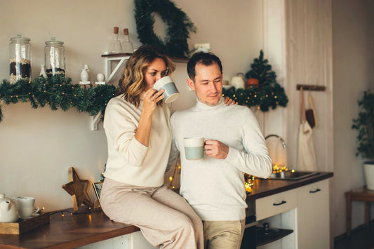 Couple sharing coffee and an honest conversation in a warm kitchen, a story about asking for what you want